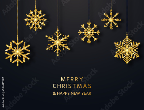 Merry Christmas greeting card with hanging glitter snowflakes. Bright gold baubles on black background. Luxury holiday design elements. Vector illustration