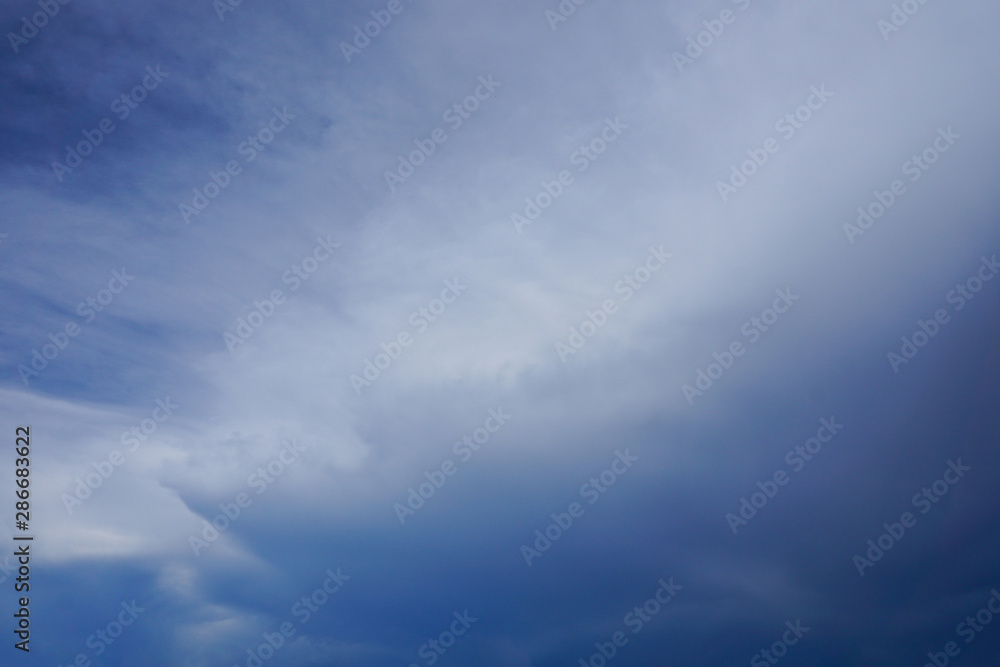 Dark sky and dramatic storm rain clouds abstract background