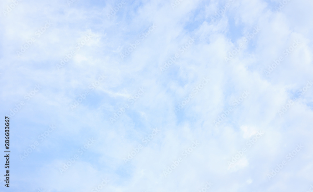 Clear blue sky with white cloud pattern background in sunshine day Clear blue sky with white cloud pattern background in sunshine day