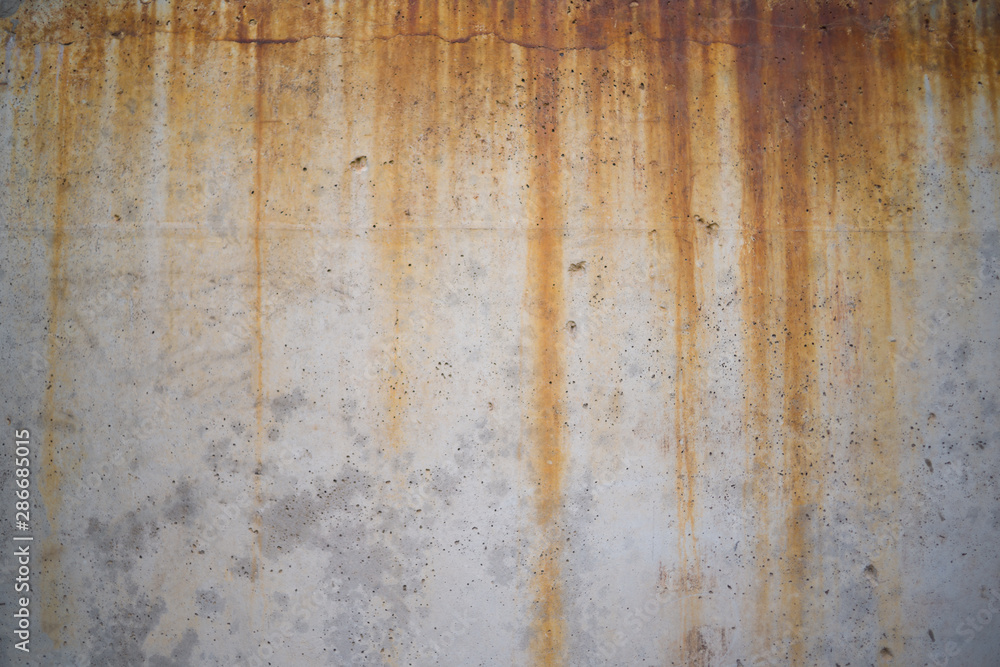 Concrete wall texture with smudges of rust. background for design.