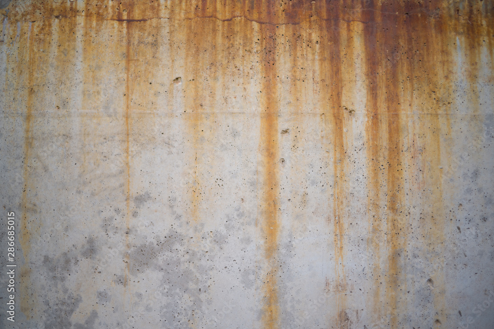 Concrete wall texture with smudges of rust. background for design. Concrete wall texture with smudges of rust. background for design.