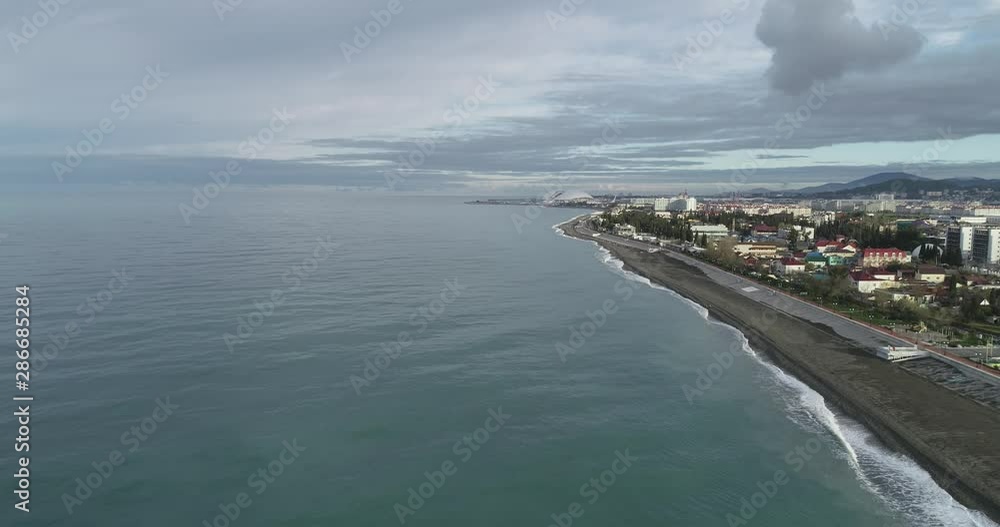Morning sea, mountains and Olimpic city Sochi Morning sea, mountains and Olimpic city Sochi