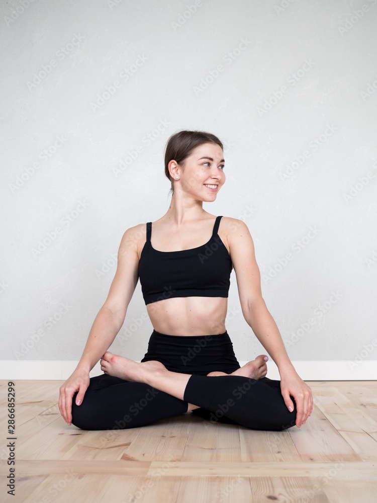 Attractive flexible girl doing yoga exercises Attractive flexible girl doing yoga exercises