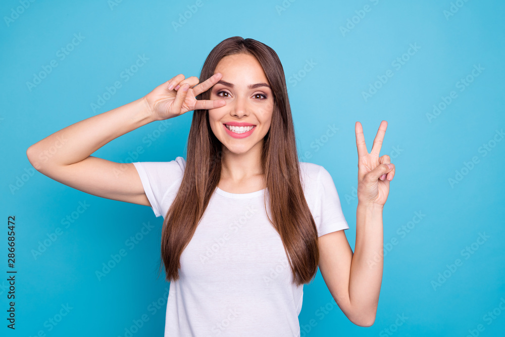 Fototapeta premium Portrait of her she nice-looking attractive lovely cheerful cheery funny straight-haired lady showing double v-sign event holiday isolated over bright vivid shine blue green teal turquoise background