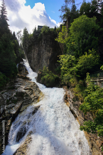 waterfall bad gastein in the centre of spy town, austrian alps