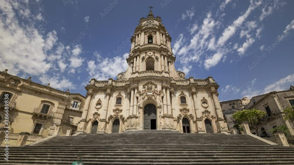 Scenic entrance stairway and facade of the baroque cathedral of Modica, Sicily Italy. Scenic entrance stairway and facade of the baroque cathedral of Modica, Sicily Italy.