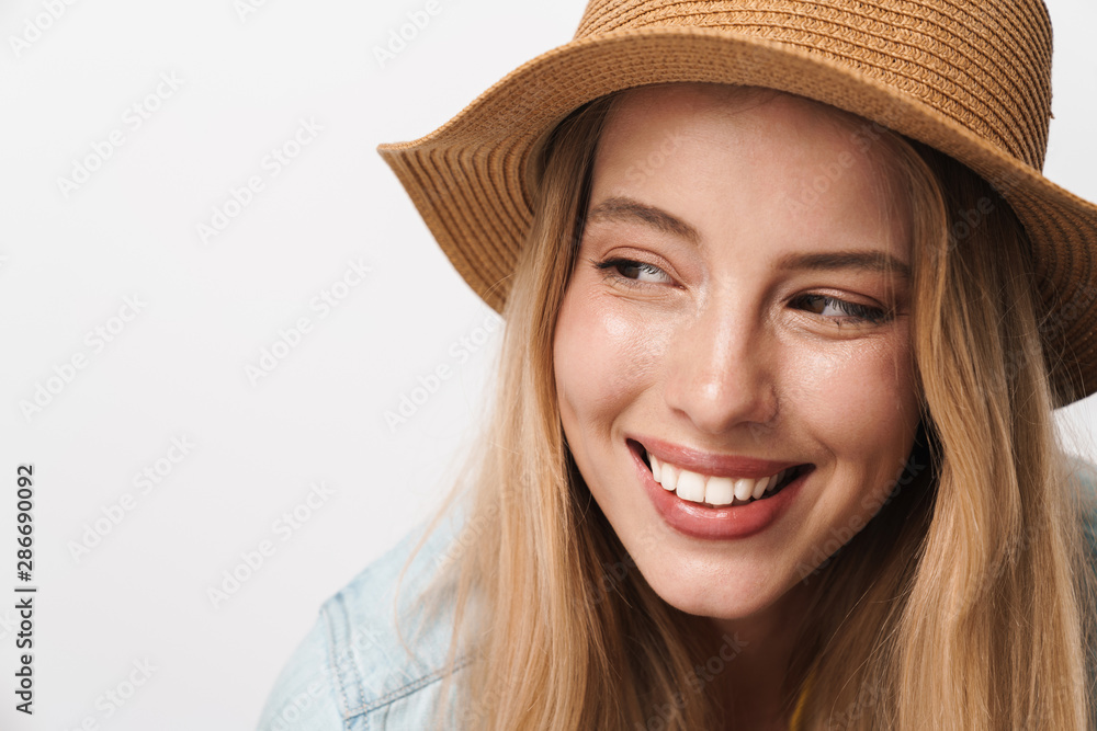 Dreaming thinking flirty amazing young pretty woman wearing hat posing isolated over white wall background looking at copyspace. Dreaming thinking flirty amazing young pretty woman wearing hat posing isolated over white wall background looking at copyspace.