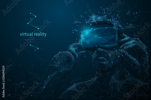 Virtual reality headset low poly wireframe banner template. Polygonal man wearing VR glasses mesh art illustration. VR games playing. 3D innovative modern technologies with connected dots © AntonKhrupinArt
