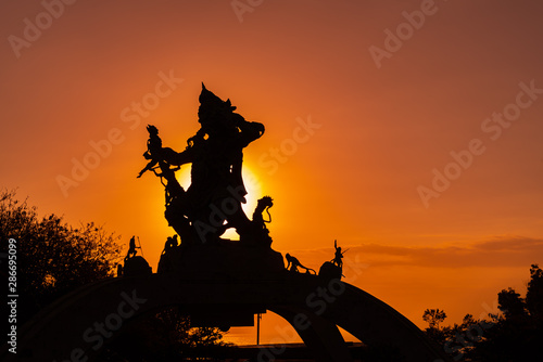 Uluwatu Temple Statue with Sunset 2