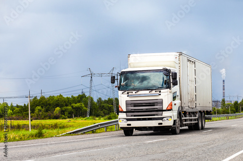 Wallpaper Mural White japanese van moving by a road Torontodigital.ca