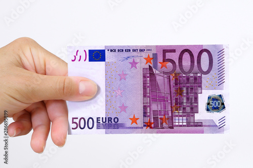Schilderij op canvas Hand holding a euro bank note