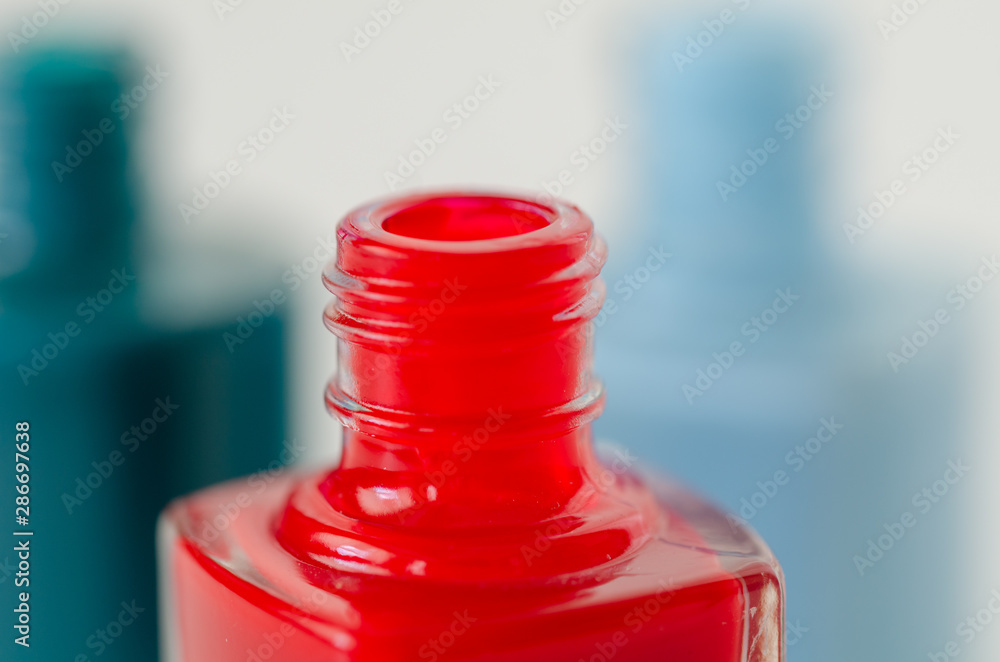 Close-up of a red nail polish bottle