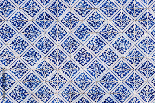 Traditional tiles on the facade of an old house in Porto, Portugal