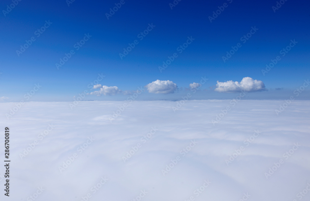  aerial image of a sky covered with clouds