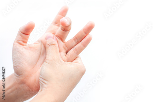 Trigger Finger Caused by People working on computer screens have been using smartphones for a long time. locking finger ( stenosing tenosynovitis disorder ) patient and catching of finger problem. photo