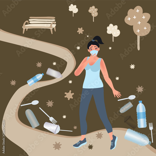 Girl in protective mask among plastic waste