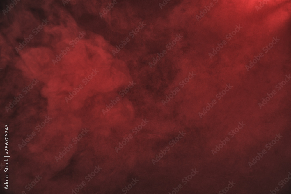 Red smoke on the dark background Red smoke on the dark background
