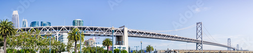Panoramic view of the Bay Bridge spanning from the Financial District to Treasure Island on a sunny and clear day, San Francisco, California © Sundry Photography