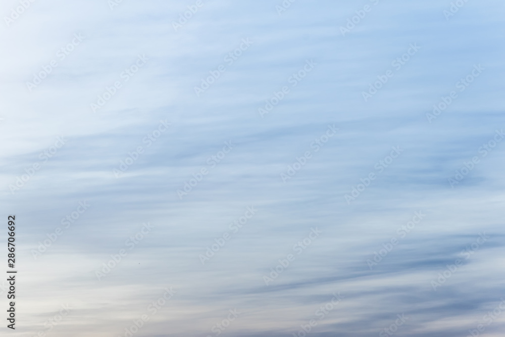 sunset background. sky with soft and blur pastel colored clouds. sunshine through the gradient cloud on the beach resort. nature. sunrise. peaceful morning sunset background. sky with soft and blur pastel colored clouds. sunshine through the gradient cloud on the beach resort. nature. sunrise. peaceful morning