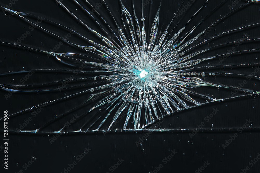 Obraz premium cracked black glass / broken glass abstract texture background
