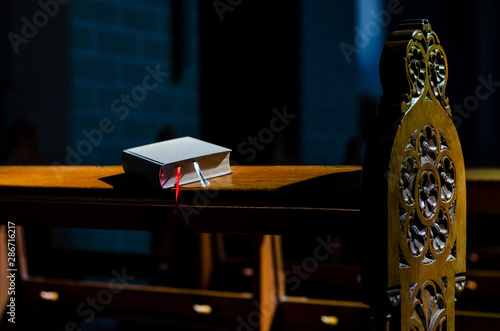 Bible lies on Kneelers in the Church.