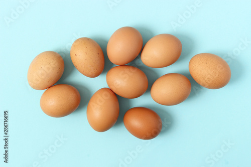 chicken eggs on a colored background. Farm products, natural eggs.