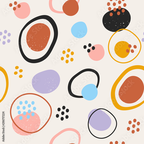 Hand drawn various round and elipse shapes and dots. Doodle objects. Abstract contemporary modern trendy vector illustration. Seamless pattern. Pastel colors. Perfect for textile prints