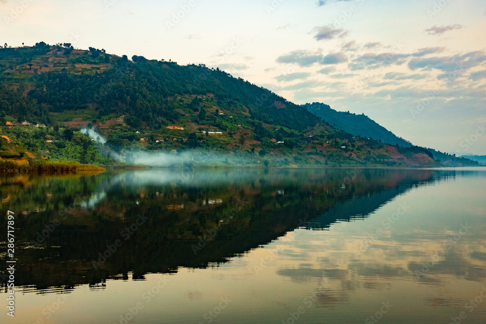 Symmetrical reflection from the shore of Lake Mutanda