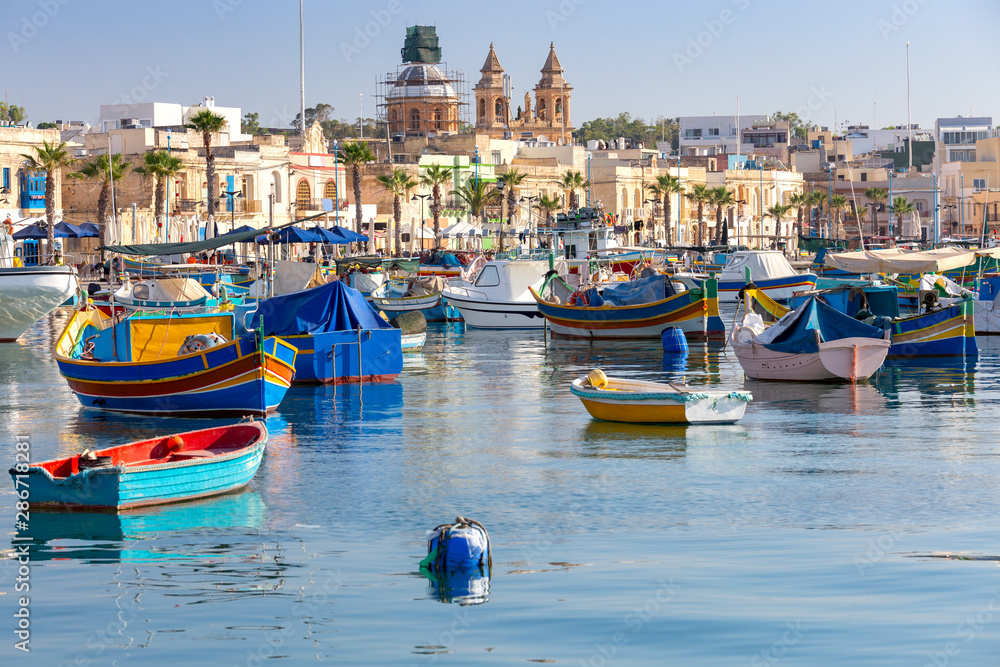 Marsaxlokk. Traditional boats Luzzu in the old harbor. Marsaxlokk. Traditional boats Luzzu in the old harbor.