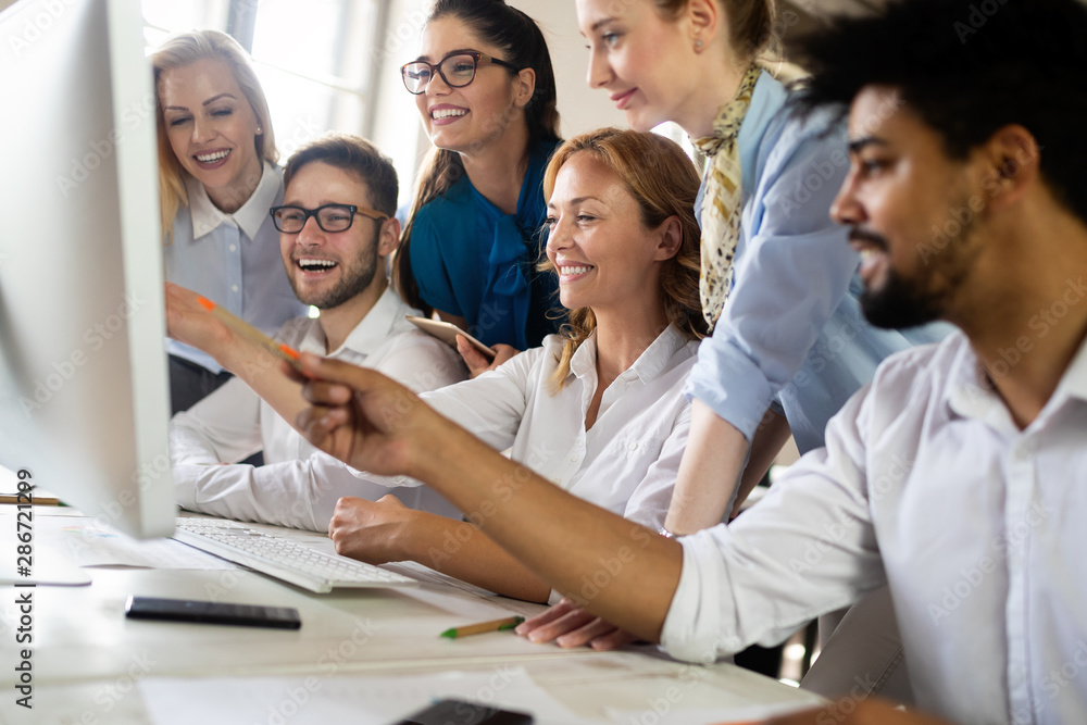 Successful business group working at the office. Successful business group working at the office.