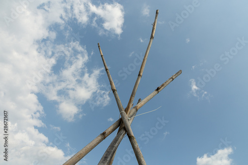 stakes against a blue sky © lindacaldwell