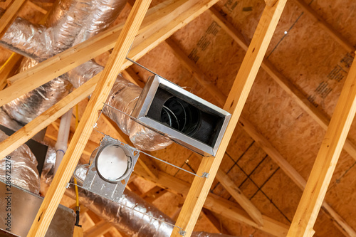 New air conditioner vents in new home construction photo