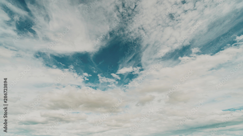Blue sky and clouds as vintage background with soft focus