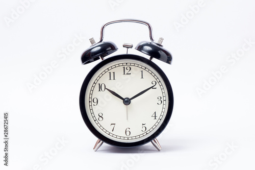 Black alarm clock at 10:10 o'clock isolate on white background