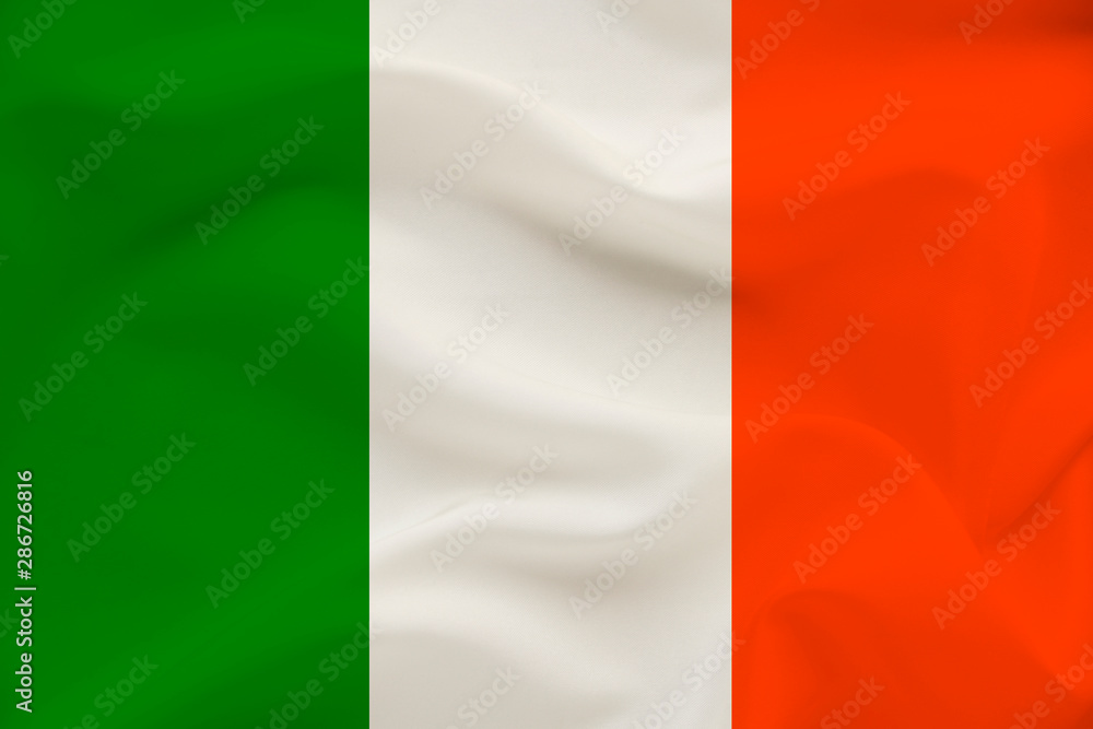national flag of the country ireland on delicate silk with wind folds, travel concept, immigration, politics, copy space, close-up national flag of the country ireland on delicate silk with wind folds, travel concept, immigration, politics, copy space, close-up