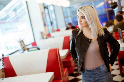 Young woman standing in the...
