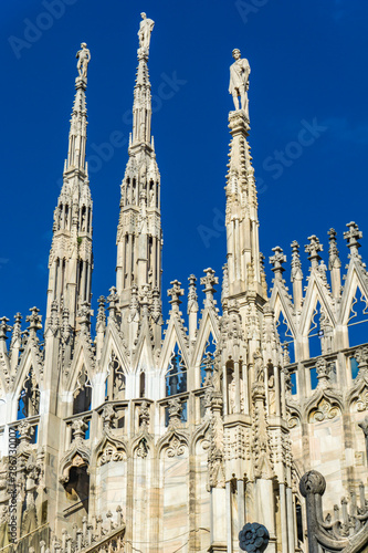 White marble statues on the...