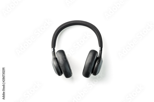 Black bluetooth headphones on a white background, isolate top view. In-Ear Headphones for DJs