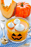 Pumpkin orange jelly or panna cotta in glass - fun and healthy idea for Halloween party dessert for kids