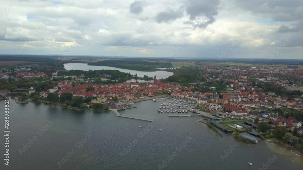 Timelapse: Aerial view on the town and surroundings of Waren at Lake Mueritz in the Mecklenburg Lake District, Germany Timelapse: Aerial view on the town and surroundings of Waren at Lake Mueritz in the Mecklenburg Lake District, Germany