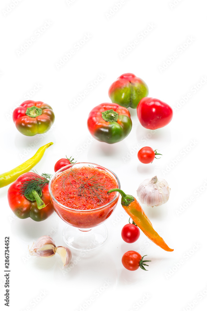 homemade hot adjika from tomatoes, hot and sweet peppers with spices homemade hot adjika from tomatoes, hot and sweet peppers with spices