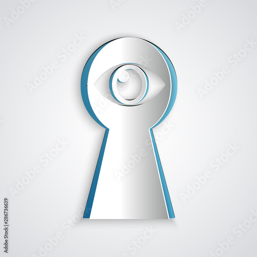 Paper cut Keyhole with eye icon isolated on grey background. The eye looks into the keyhole. Keyhole eye hole. Paper art style. Vector Illustration