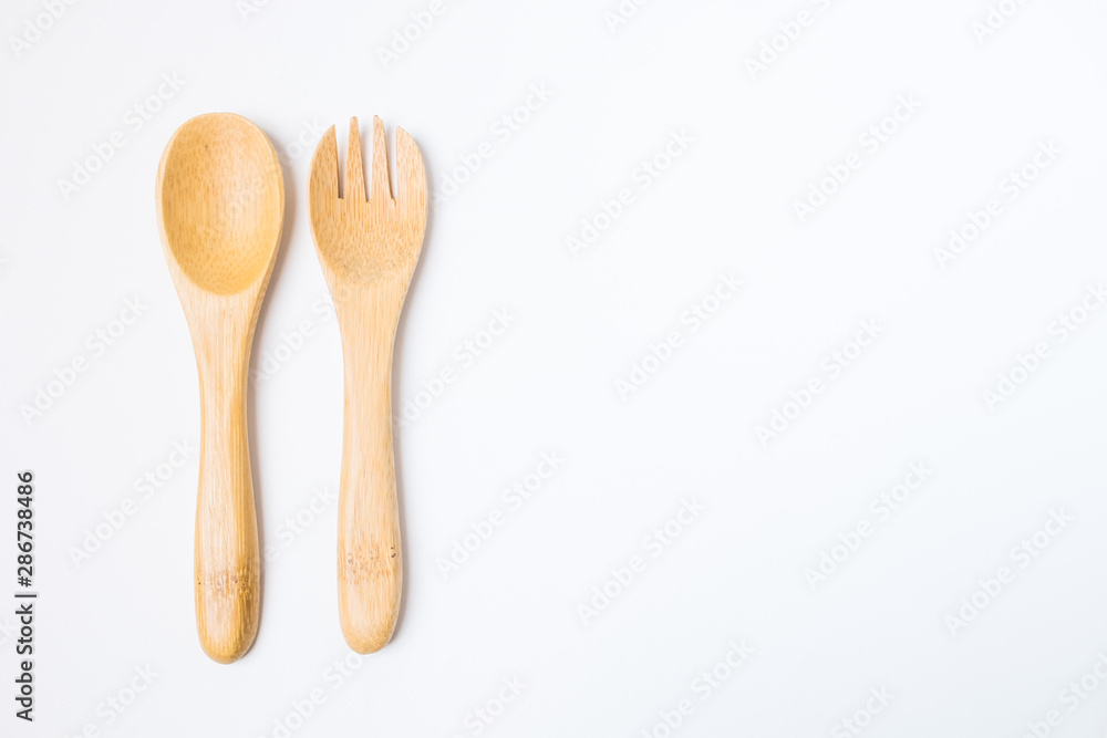 Wooden spoon and fork isolated on white Wooden spoon and fork isolated on white