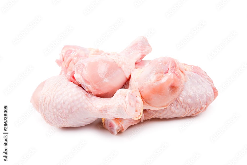 Tasty raw chicken legs. Top view. Isolated on white