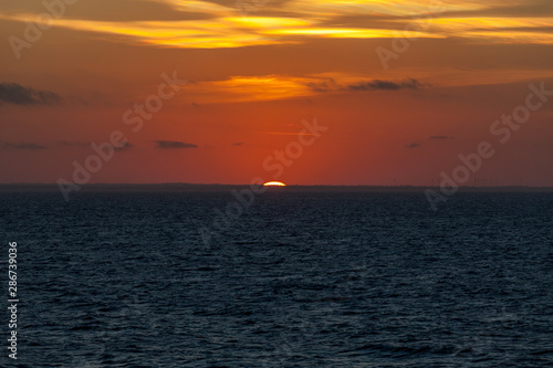 Awesome sunset behind the profile of the Adriatic coast © Gianluca
