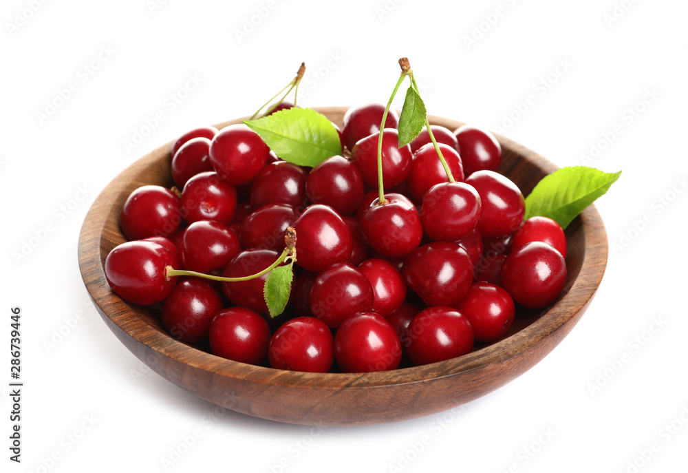 Wooden plate of delicious ripe sweet cherries on white background Wooden plate of delicious ripe sweet cherries on white background