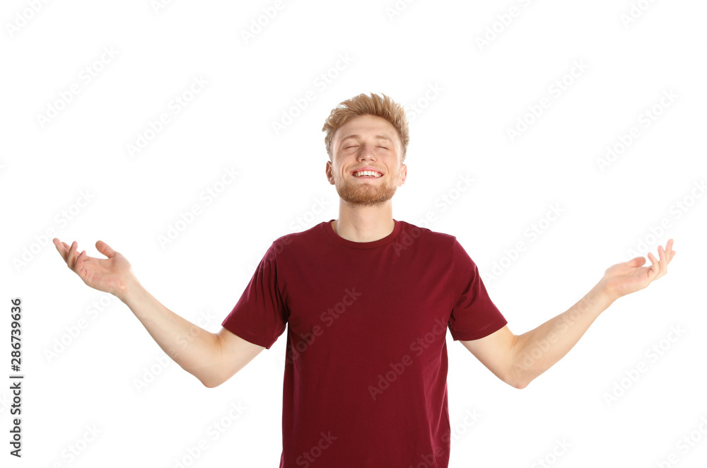 Young man with air conditioner remote on white background Young man with air conditioner remote on white background