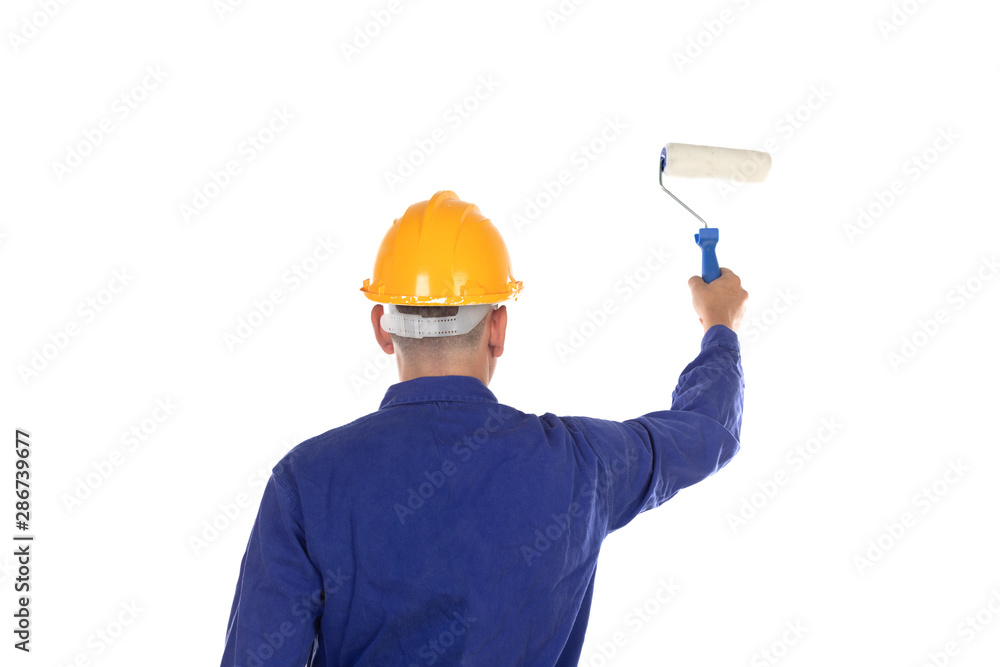 Construction painter with yellow helmet Construction painter with yellow helmet