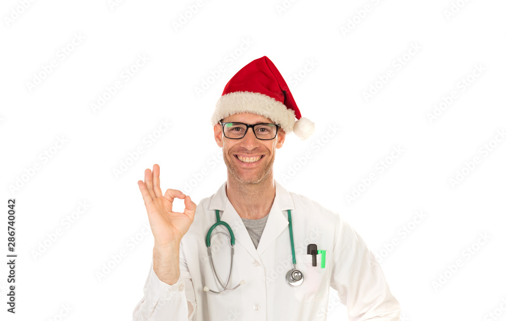Handsome doctor with christmas hat wearing a Christmas hat Handsome doctor with christmas hat wearing a Christmas hat