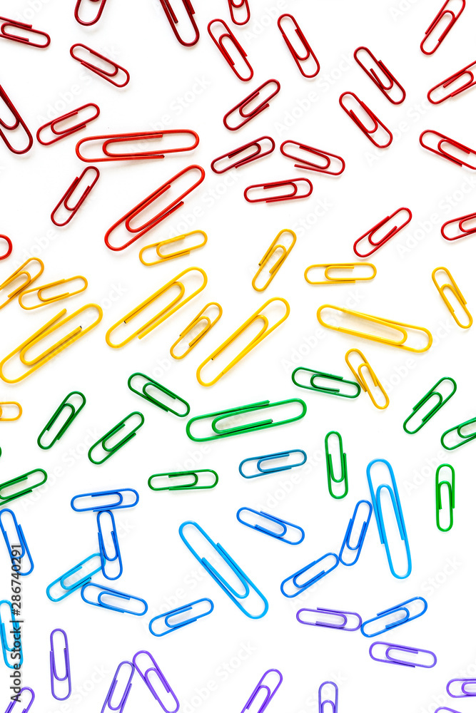 Background of paperclips in rainbow colors Background of paperclips in rainbow colors